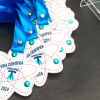Medallas de acrilico personalizadas con corte especial en forma de atomo.
